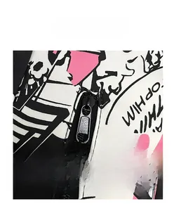 Detail view of the durable black metal zipper closure on a graffiti canvas backpack