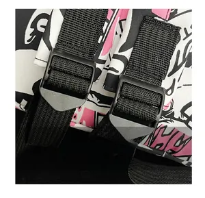 Detail of adjustable nylon strap and cartoon doodle print on trendy school backpack