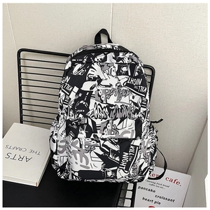Detail of a black and white graffiti backpack with Kill The Night print on canvas fabric