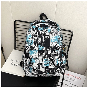 Detail of white graffiti canvas backpack with astronaut charm and street art prints