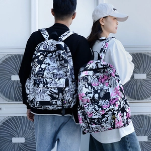 Graffiti printed street style backpack with large capacity and decorative pendant for students