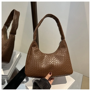 Detail of deep brown Intrecciato woven leather hobo bag with silver zipper closure