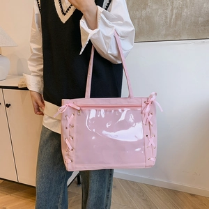 Borsa Ita rosa con finestra trasparente e dettagli in nastro a tracolla chic