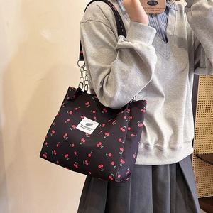 Large capacity black tote bag with red cherry prints and stylish chain straps for women