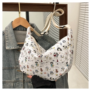 Detail of white moon shoulder bag with cute animal prints and adjustable strap
