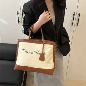 Retro canvas and brown leather tote bag with Frida Kahlo lettering for daily use