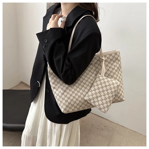 Fashionable tote bag set with all-over M-letter print and matching mini clutch bag