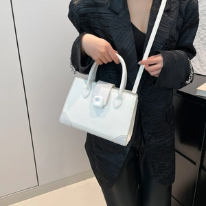 Elegant white square tote bag with crocodile pattern accents and adjustable strap