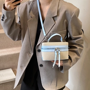 Mini box crossbody bag in beige woven canvas with light blue leather trim detail