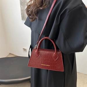 Retro burgundy oversized tote bag with crocodile pattern and golden metal hardware
