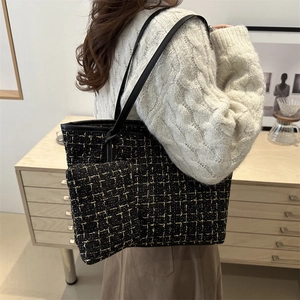 Elegant black and gold tweed tote bag with matching coin purse and leather straps
