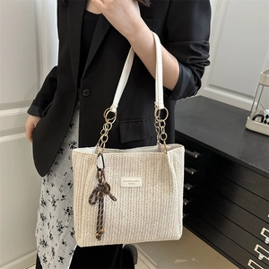 Sac fourre-tout tissé à la mode en paille beige avec nœud élégant et chaîne