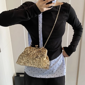 Elegant gold sequin evening clutch bag with kiss-lock closure and gold chain strap