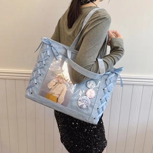 Light blue Ita bag tote with clear PVC window and ribbon detail for anime fans