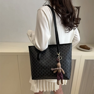 Large capacity black tote bag with M-letter pattern and plush bunny pendant for daily use