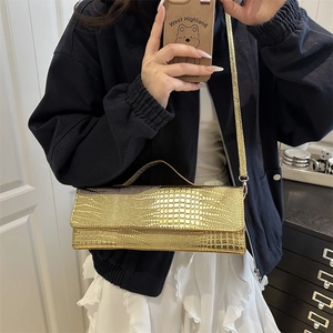 Golden crocodile pattern textured rectangular handbag with elegant gold chain strap