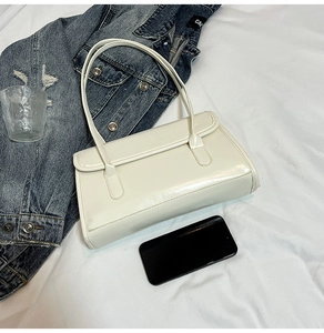 Chic cream white large capacity tote bag displayed with daily lifestyle accessories