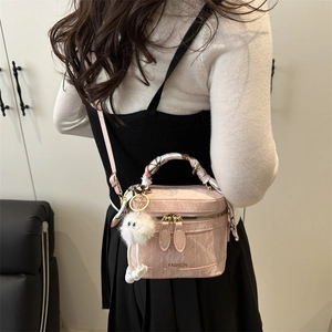 Pink marble pattern bucket bag with silk scarf handle and plush monster charm