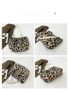 Detail shots of leopard print plush tote bag with white leather and metal chain straps