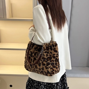 Chic leopard print plush tote bag with faux fur texture and brown leather chain strap
