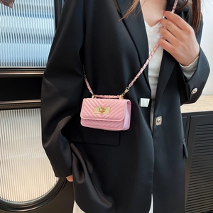 Pink quilted chevron mini crossbody bag with gold chain strap and twist lock for women