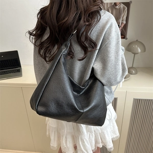 Large black Maillard style tote bag in textured faux leather for daily office commuting