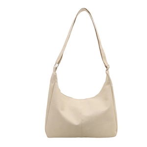 Minimalist beige hobo tote bag in textured leather with spacious interior and shoulder strap