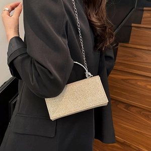 Sac de soirée pailleté champagne doré avec poignée ronde en métal et bandoulière