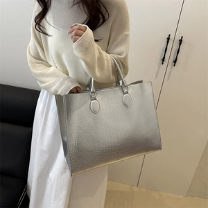 Silver crocodile-embossed large tote bag with top handles for stylish daily commute