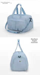 Detailed side view of light blue travel bag showing ventilated shoe compartment and zippers