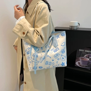 Large capacity white tote bag with light blue graffiti prints and top handles