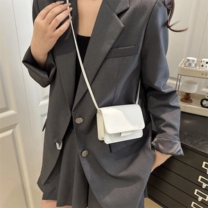 Minimalist white square crossbody bag for women in premium PU leather with flap closure