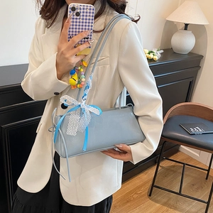 Light blue rectangular shoulder bag with lace bow and ribbon detail for women