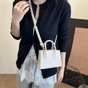 White faux-crocodile embossed mini tote bag with gold hardware and shoulder strap
