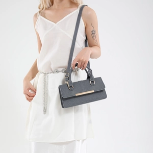 Elegant grey canvas shoulder bag for women with gold hardware and top handle strap