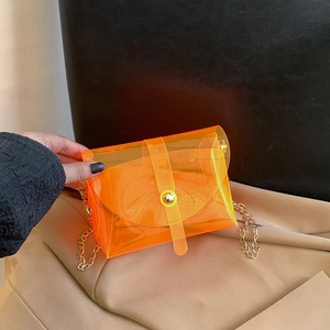 Sac gelée transparent orange fluo avec bandoulière chaîne dorée pour femme