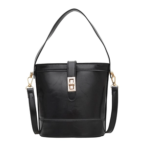 Classic black bucket tote bag with gold metallic buckle and adjustable shoulder straps