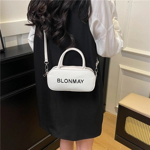 White woven leather handbag with BLONMAY logo, crossbody strap, and top handle detail