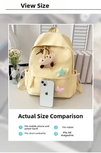 Detailed size comparison of a yellow nylon backpack with a smartphone and plush bear