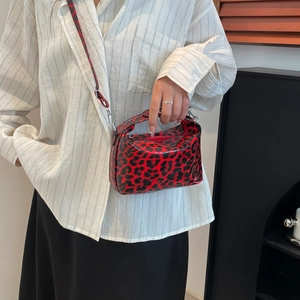 Glossy red leopard print tote bag for women shown as a stylish handbag and crossbody bag