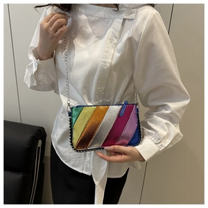 Close-up of rainbow metallic crossbody bag with silver beaded trim and chain strap