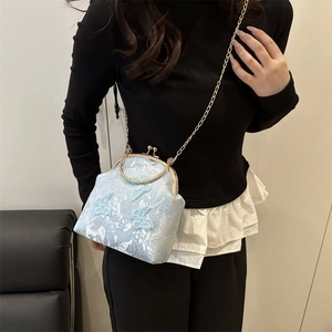 Light blue floral jacquard crossbody bag with 3D butterfly appliques and gold chain