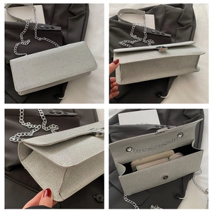 Detailed views of silver glitter square clutch bag with metal chain and interior space