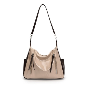 Sac cabas moderne en cuir verni beige et marron avec zips métalliques élégants