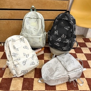 Four colors of lightweight butterfly print nylon backpacks for school and travel
