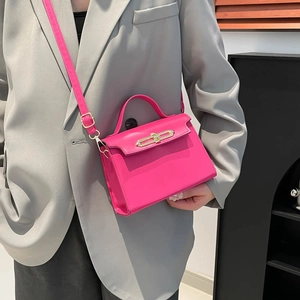 Fuchsia leather top handle crossbody bag with gold hardware for women's city commute
