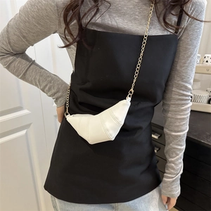 Chic white mini croissant bag with gold chain strap for fashionable crossbody wear