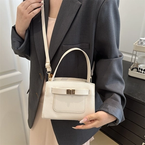 Minimalist white PU leather tote bag with gold hardware and crossbody strap for women