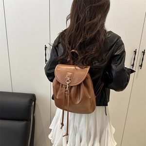 Chic brown PU leather backpack for women with flap and drawstring closure in casual style