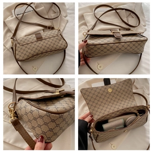 Détails du sac bandoulière vintage avec logo, capacité intérieure et texture premium